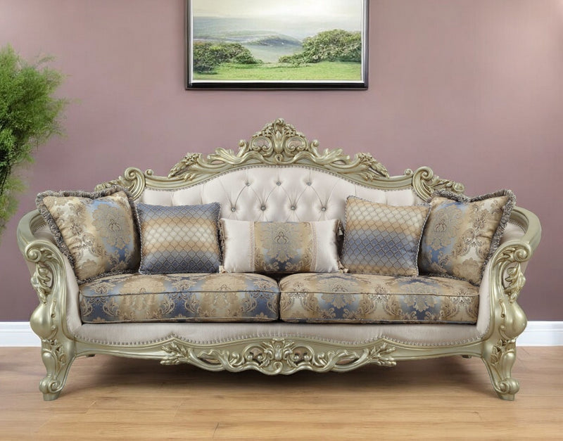 Antiqued White Velvet Curved Floral Sofa And Toss Pillows With Champagne Legs